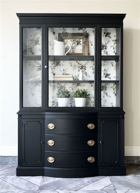 black hutch with glass doors